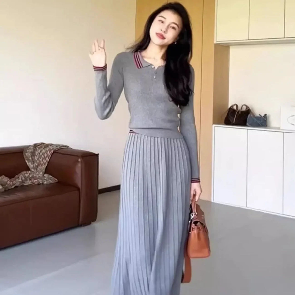 Élan Grace Pleated Midi Skirt